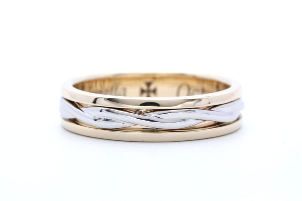 Gold and platinum twist men's wedding ring